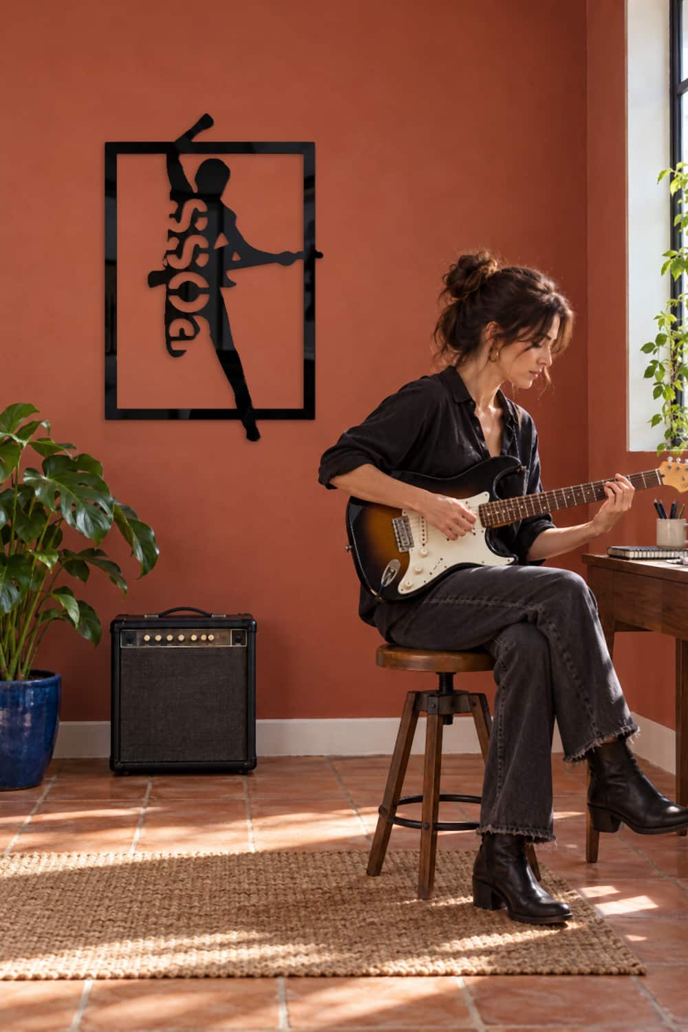 Bruce Springsteen Silueta: estudio terracota con guitarrista