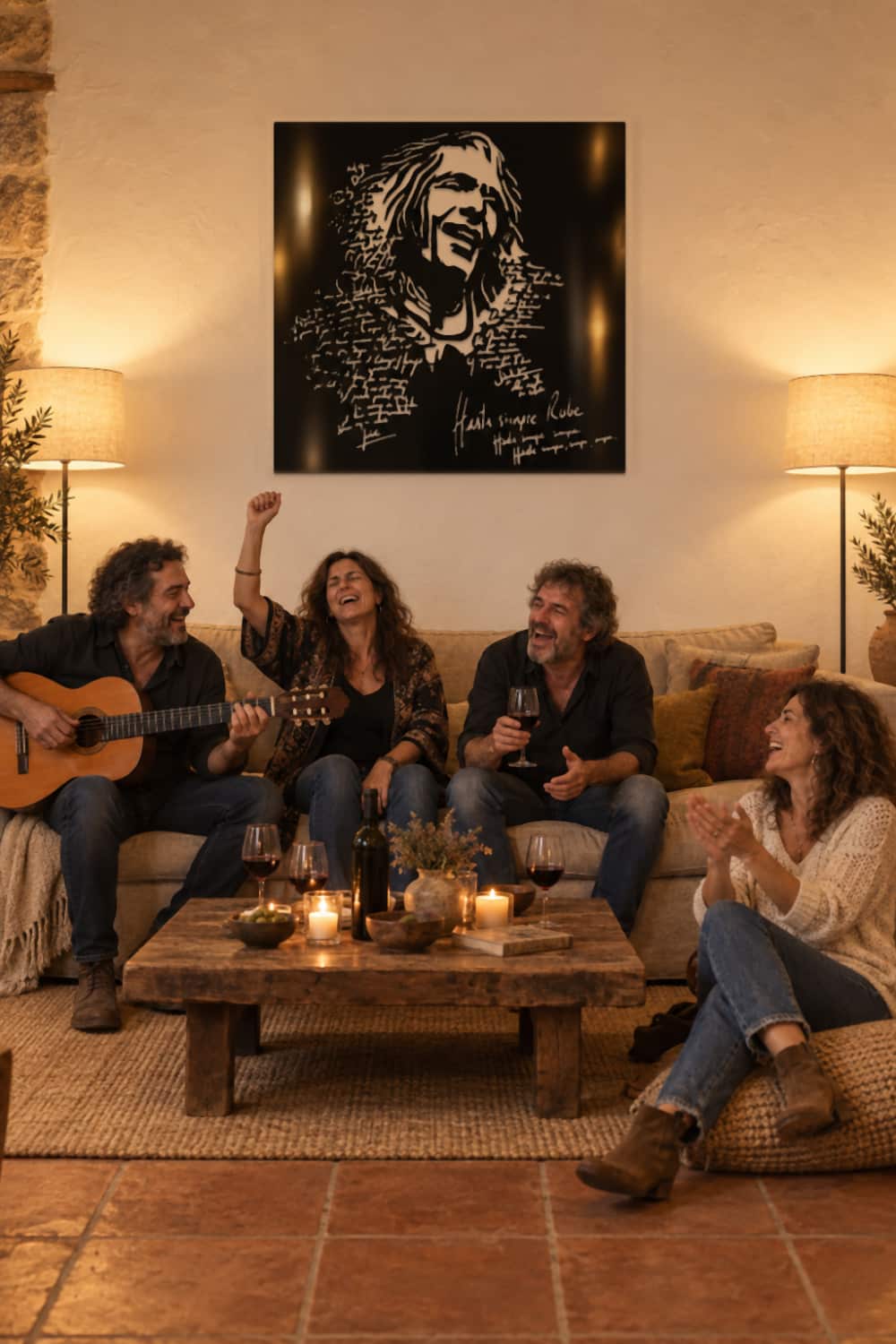 Cuadro Robe Iniesta en un salón de noche, con amigos cantando a la guitarra entre vino y velas