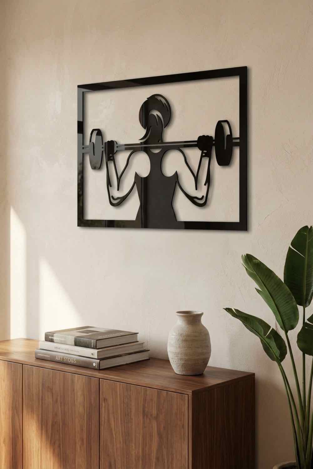 Chica alzando peso - Cuadro decorativo | Cortayrecorta.es