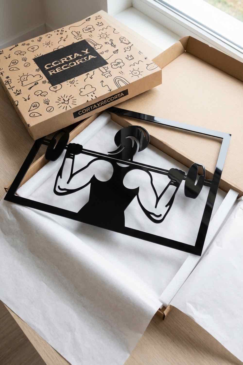 Chica alzando peso - Cuadro decorativo | Cortayrecorta.es