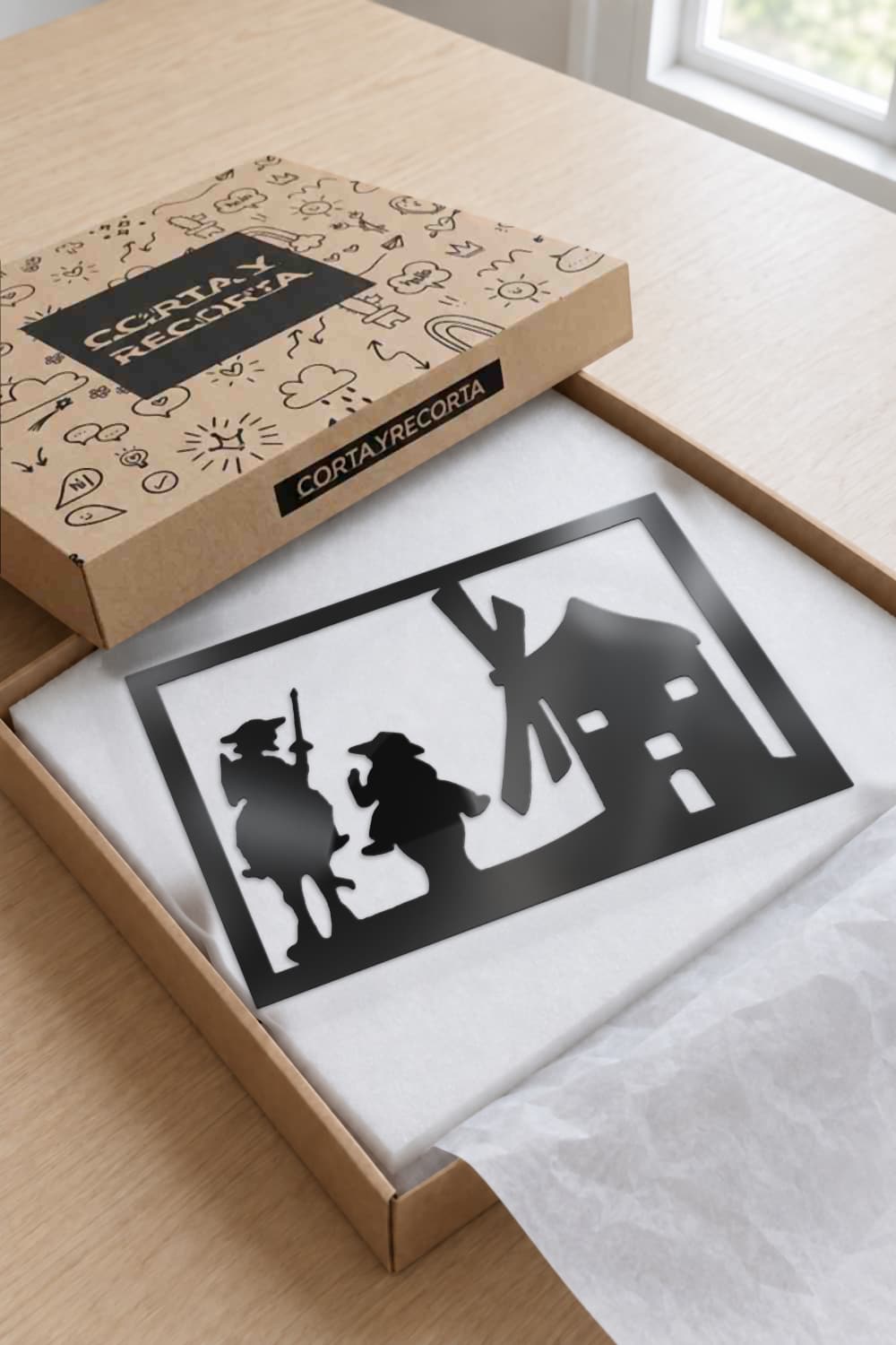 Cuadro Don Quijote de la Mancha de metal en su caja de Corta y Recorta, listo para regalar