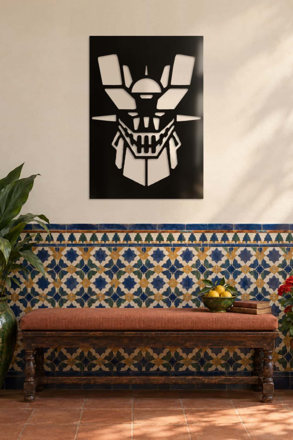 Cuadro Mazinger Z de aluminio negro sobre un banco y zócalo de azulejos en una galería cordobesa